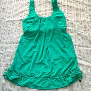 Lululemon teal women’s tank top with bra (no padding) size small(6-8).